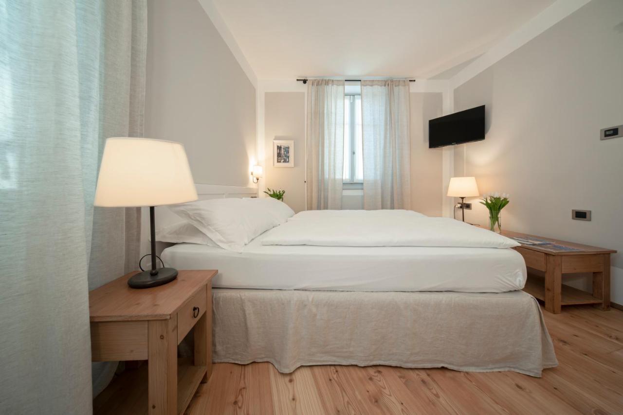 La Canonica Suite Apartments New Location Trento Bagian luar foto