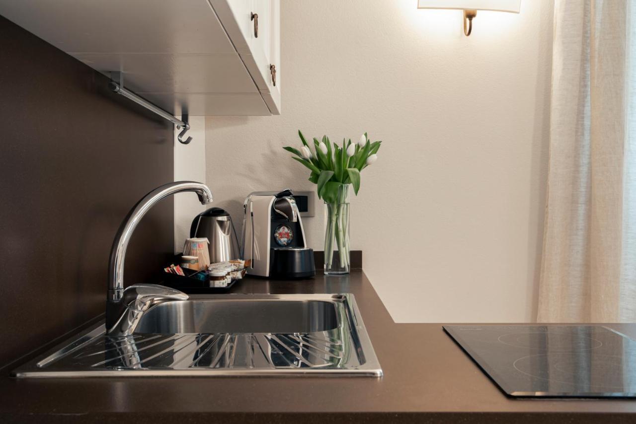 La Canonica Suite Apartments New Location Trento Bagian luar foto