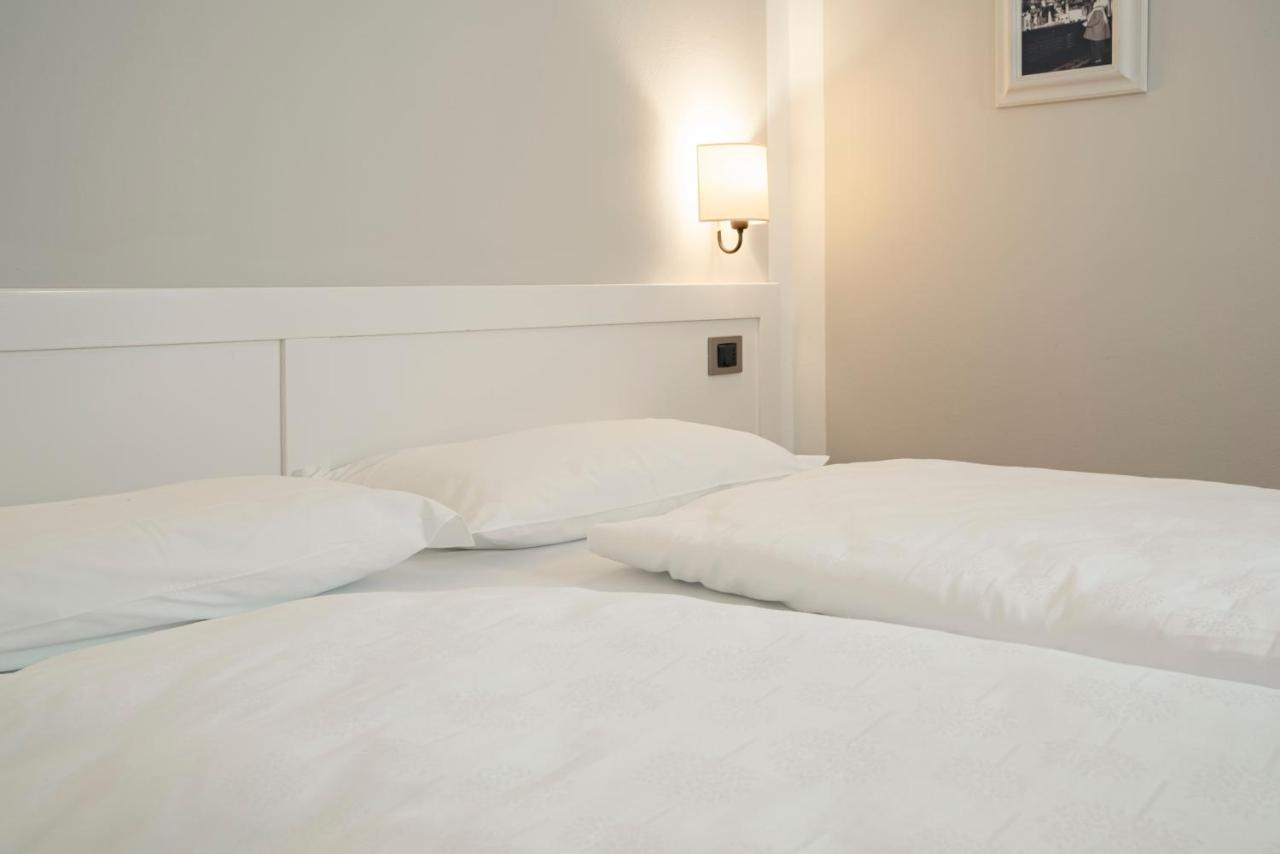 La Canonica Suite Apartments New Location Trento Bagian luar foto