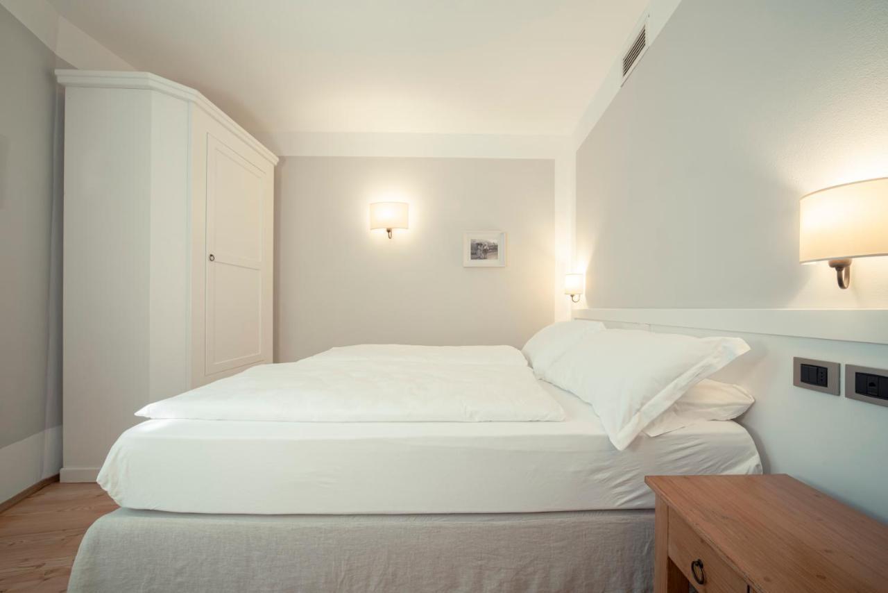 La Canonica Suite Apartments New Location Trento Bagian luar foto